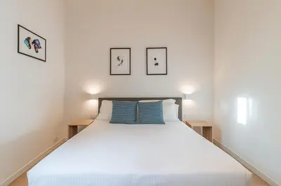 Letto o letti in una camera di Hotiday Apartments Siracusa