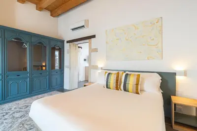 Letto o letti in una camera di Hotiday Apartments Siracusa