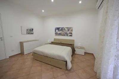 Letto o letti in una camera di A Casuzza House