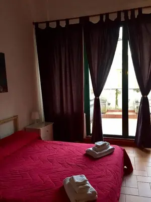 Letto o letti in una camera di La Terrazza sul Castello