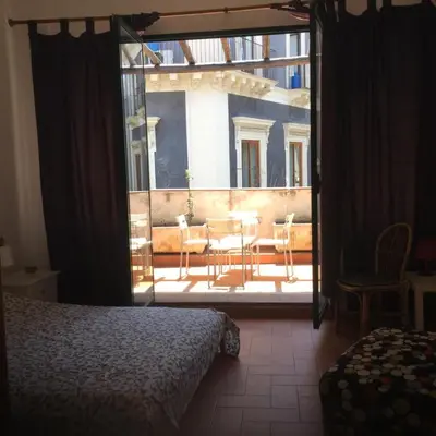 Letto o letti in una camera di La Terrazza sul Castello