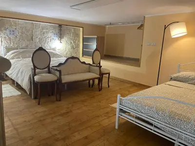 Letto o letti in una camera di Loft al centro