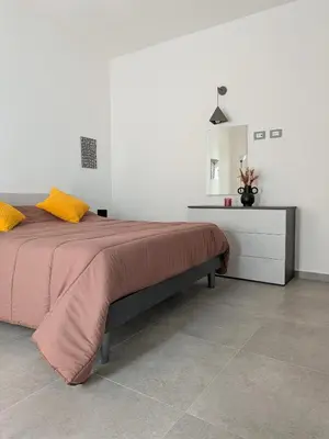 Letto o letti in una camera di Siraké