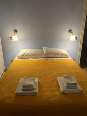 Letto o letti in una camera di Maison San Michele - historical features in center