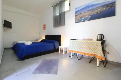 Letto o letti in una camera di bed and fly near 2 fontanarossa 800mt aeroporto catania