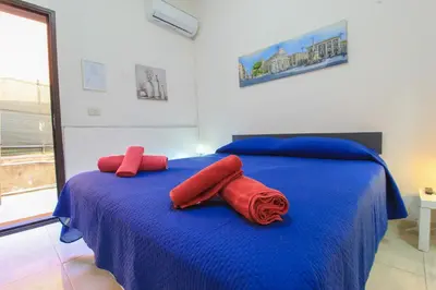 Letto o letti in una camera di bed and fly near 2 fontanarossa 800mt aeroporto catania
