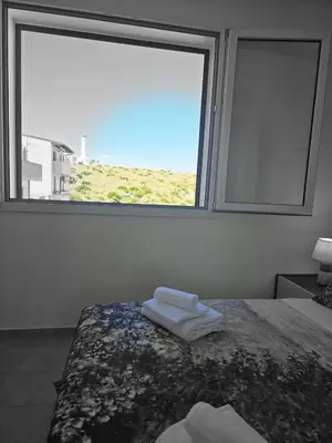 Letto o letti in una camera di ViChi