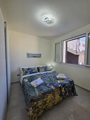 Letto o letti in una camera di ViChi