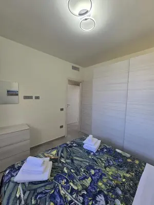 Letto o letti in una camera di ViChi