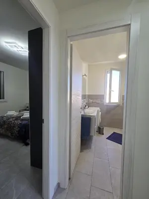 Letto o letti in una camera di ViChi