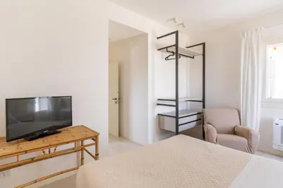 TV o dispositivi per l'intrattenimento presso Villa Plemmiria by the Sea by Wonderful Italy