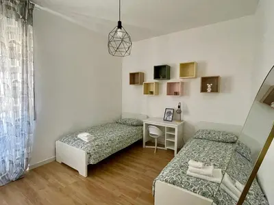 Letto o letti in una camera di Burro&Salvia