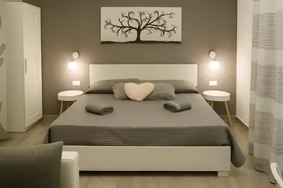 Letto o letti in una camera di Casa tra teatro e Ortigia
