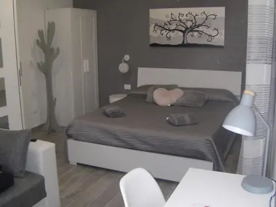 Letto o letti in una camera di Casa tra teatro e Ortigia