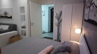 Letto o letti in una camera di Casa tra teatro e Ortigia