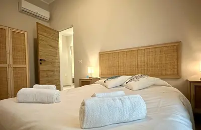 Letto o letti in una camera di Nadir Holiday Home