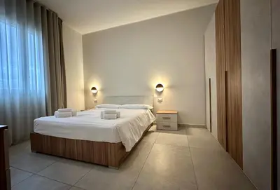 Letto o letti in una camera di Nadir Holiday Home
