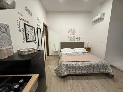 Letto o letti in una camera di Dimora Siciliana