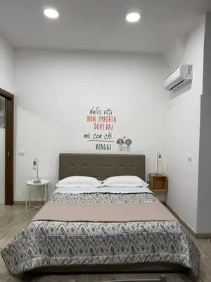 Letto o letti in una camera di Dimora Siciliana