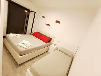 Letto o letti in una camera di VillAMURI