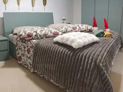 Letto o letti in una camera di Ortigia Domus