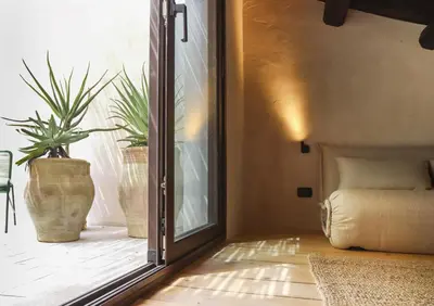 Letto o letti in una camera di Casa Leopardo con piscina privata
