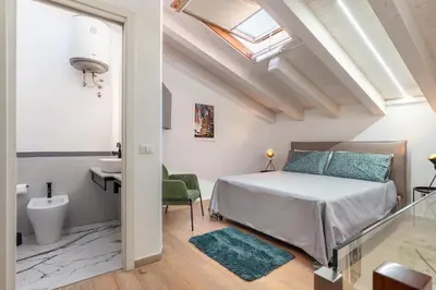 Letto o letti in una camera di GuestHost - San Giuliano 81