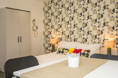 Letto o letti in una camera di Galatola Home - Lumina Collection
