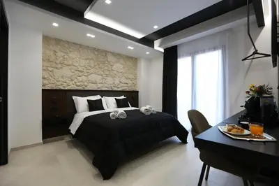 Letto o letti in una camera di B&B Il Moro Luxury Rooms