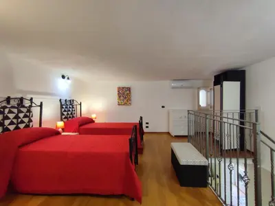 Letto o letti in una camera di Scogghiu d'amuri