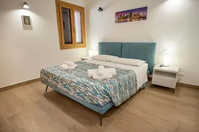 Letto o letti in una camera di VILLA SEA VIEW IN SICILY, Real Relax