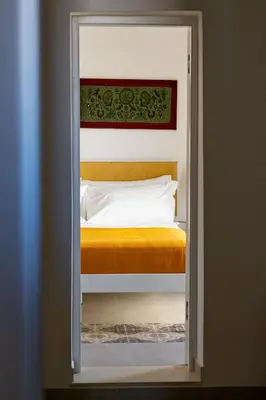 Letto o letti in una camera di Myth Apartments