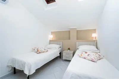 Letto o letti in una camera di Terrazza Privata, 2 Camere, Catania Centro Storico