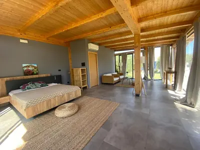 Letto o letti in una camera di Glass Lodge Caponegro