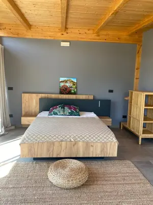 Letto o letti in una camera di Glass Lodge Caponegro