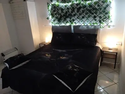 Letto o letti in una camera di Il covo del gattonero