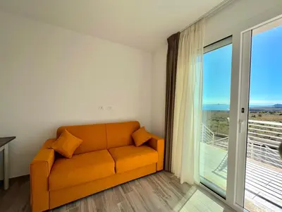 Area soggiorno di Seacily Villas