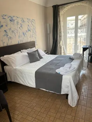 Letto o letti in una camera di bedbreakfast DINASTIA