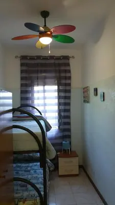 Letto o letti in una camera di Casa Azzurra