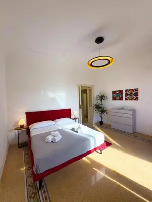 Letto o letti in una camera di A Casa di Amaré apartment Ortigia