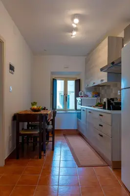 Cucina o angolo cottura di A Casa di Amaré apartment Ortigia