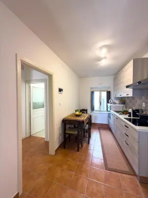 Cucina o angolo cottura di A Casa di Amaré apartment Ortigia