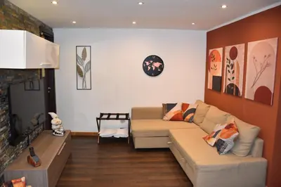Area soggiorno di Ivy Central Apartment - Casa vacanze Catania centro