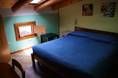 Letto o letti in una camera di Villa Belfronte