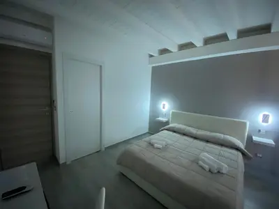 Letto o letti in una camera di Le Tre Anfore