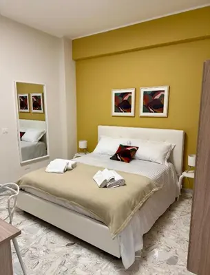 Letto o letti in una camera di D'Armisi Casa Mariella
