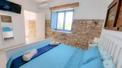 Letto o letti in una camera di Casale Scirbia