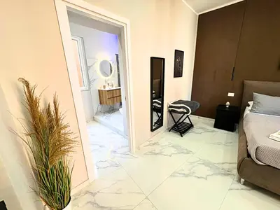 Letto o letti in una camera di Lole Home