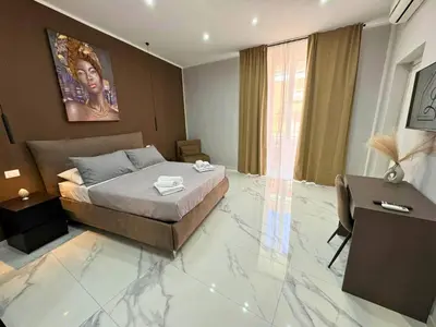 Letto o letti in una camera di Lole Home