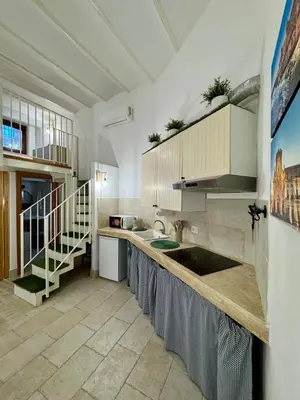 Cucina o angolo cottura di Carmela Homes&Residences ortigia